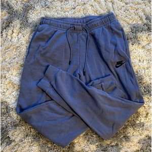 Women’s Nike sweatpants in blue with black lettering. New without tags in size S